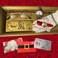 Load image into Gallery viewer, santas evidence kit with pocket watch, glove, brass button, $2 christmas dollars, sleigh license and business cards on a gold tray and red velvet holiday background