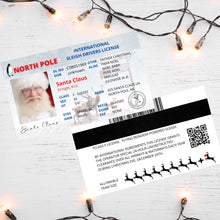 Load image into Gallery viewer, Front and Back view of a realistic lost Santa sleigh license on a white wooden background with led holiday lights